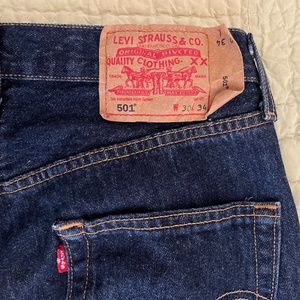 Levi 501’s 30/34 but measured closer to 30/32.